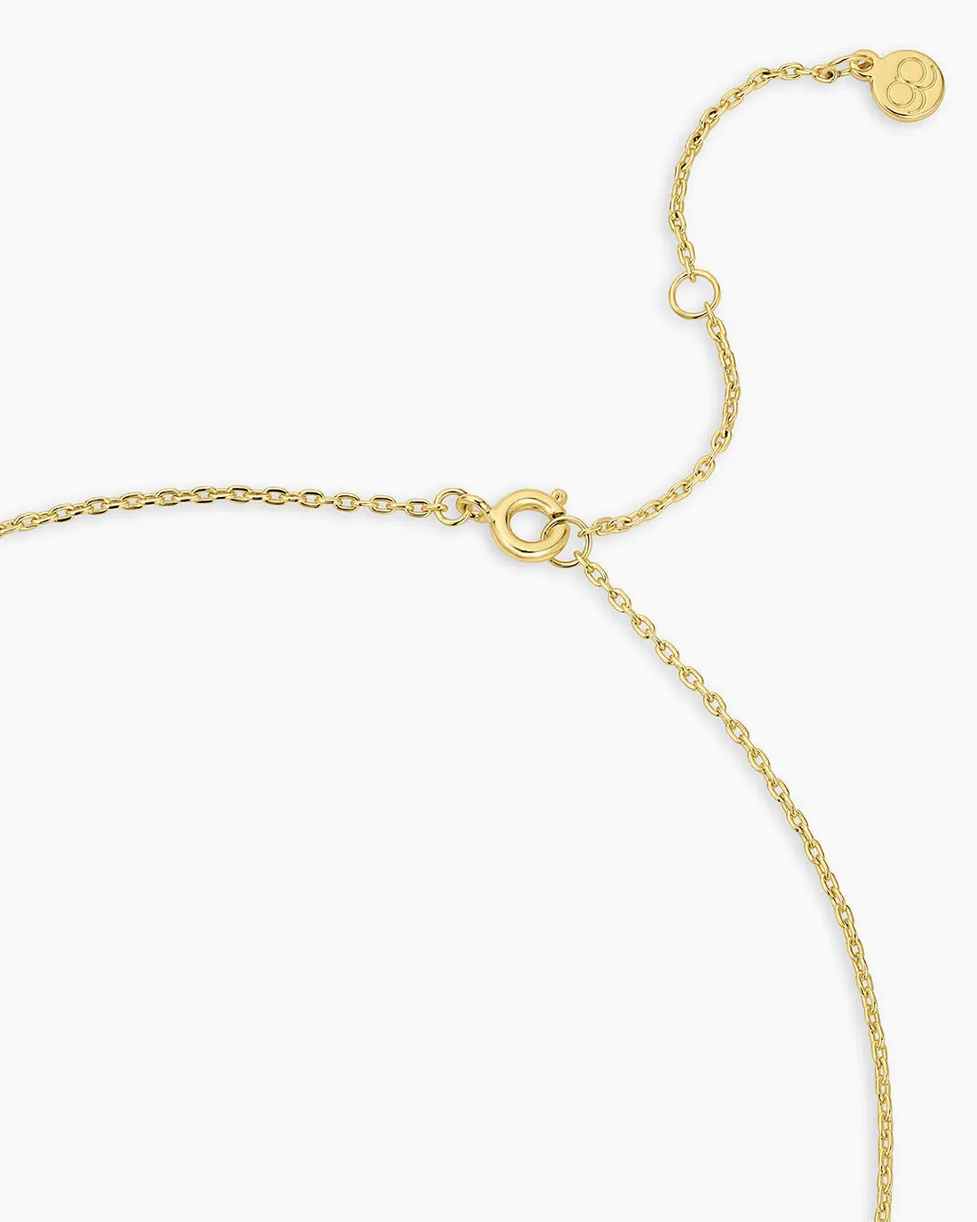 Gold bracelet on a white background