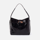 Black handbag with a phone pocket on a white background
