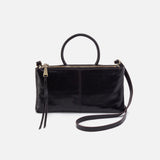 A black leather sable crossbody handbag with a shoulder strap and a zipper closure.