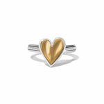 Heart-shaped ring with gold center and silver band on a white background