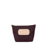 Small purple pouch with a beige patch on a white background