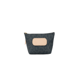 Small pouch with patterned design and beige patch on a black background