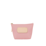 Pink pouch with beige patch and zipper on a white background