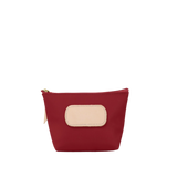 Red pouch with beige patch on a white background