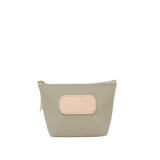 Small green pouch with a beige patch on a white background
