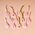 Set of decorative items with various designs on a beige background