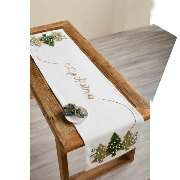 Christmas-themed table runner with trees and 'Merry Christmas' text on a wooden table.