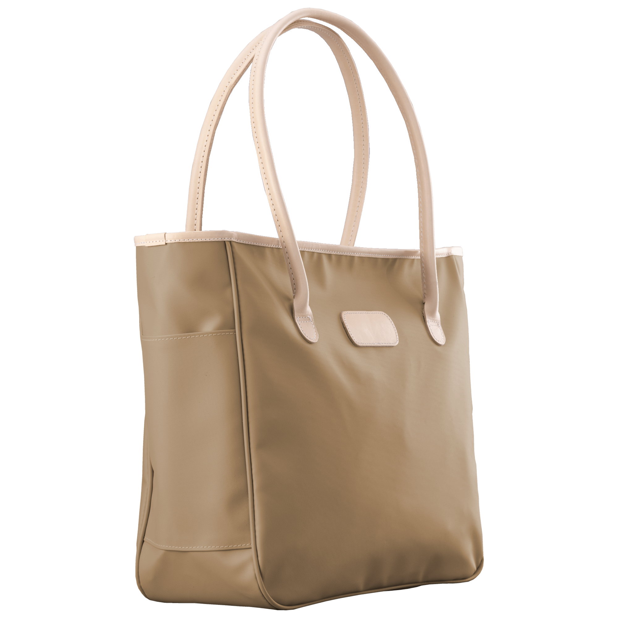 Beige tote bag with white handles on a black background