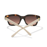 Sunglasses with tortoiseshell frame and brown gradient lenses on a white background