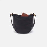 Black handbag with a brown phone case on a white background