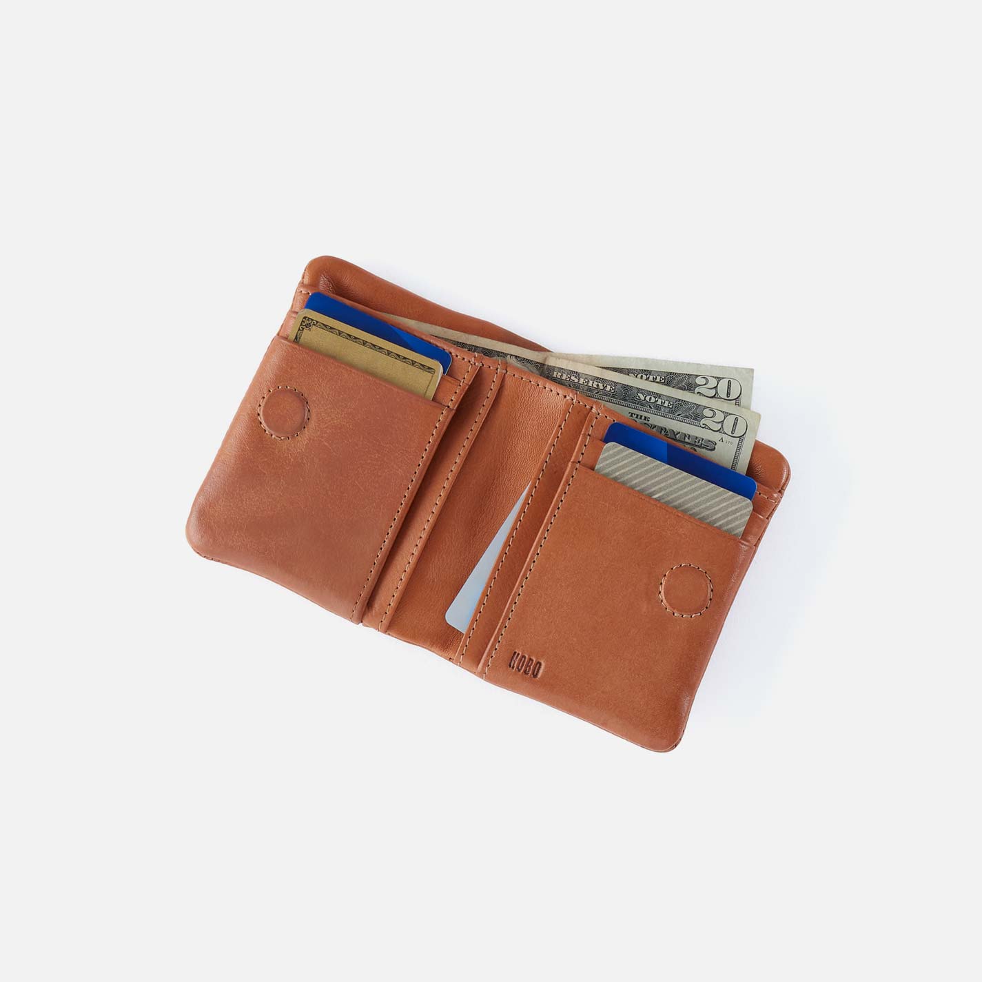 Brown leather wallet with money and cards on a white background