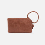 Brown suede clutch bag with a wrist strap on a light gray background