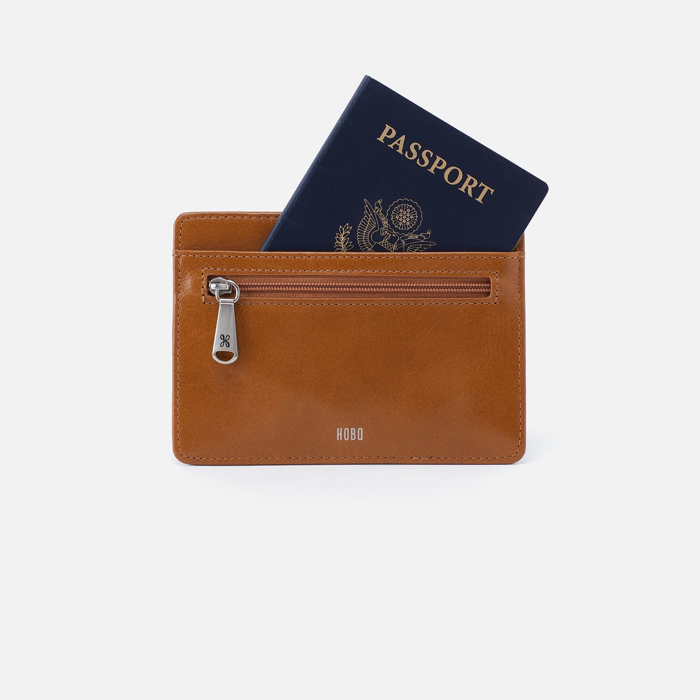 Brown leather wallet with a passport on a white background