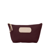 Maroon pouch with beige patch and zipper on a white background