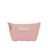 Pink pouch with beige patch and zipper on a white background