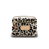 Leopard print cosmetic bag with beige accents on a white background
