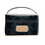 Camouflage-patterned cosmetic bag with a beige patch on a black background