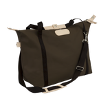 Brown bag with black straps on a white background