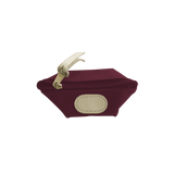 Maroon pouch with beige strap and patch on a white background