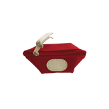 Red pouch with beige zipper and patch on a white background