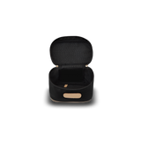 Black travel case with gold accent on a white background