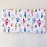 Flannel fabric with colorful Christmas ornament pattern on a white background