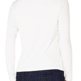 White long-sleeve top worn by a person on a white background