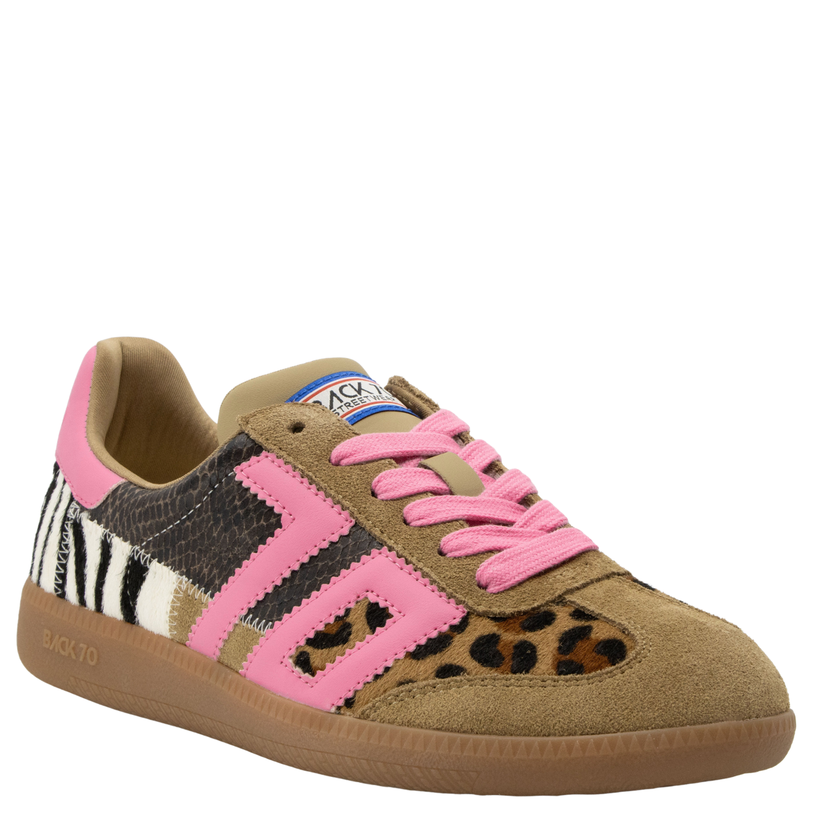 Sneaker with pink and animal print details on a white background