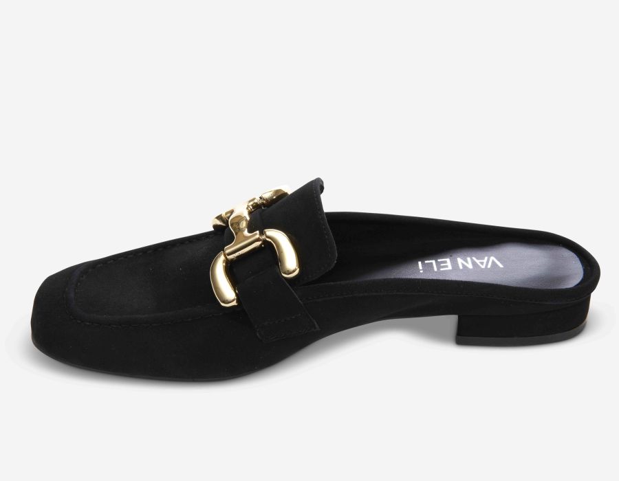 Black slip-on shoe with gold buckle on a white background