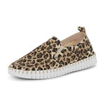 Leopard print slip-on sneaker with white sole on a white background