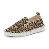 Leopard print slip-on sneaker with white sole on a white background