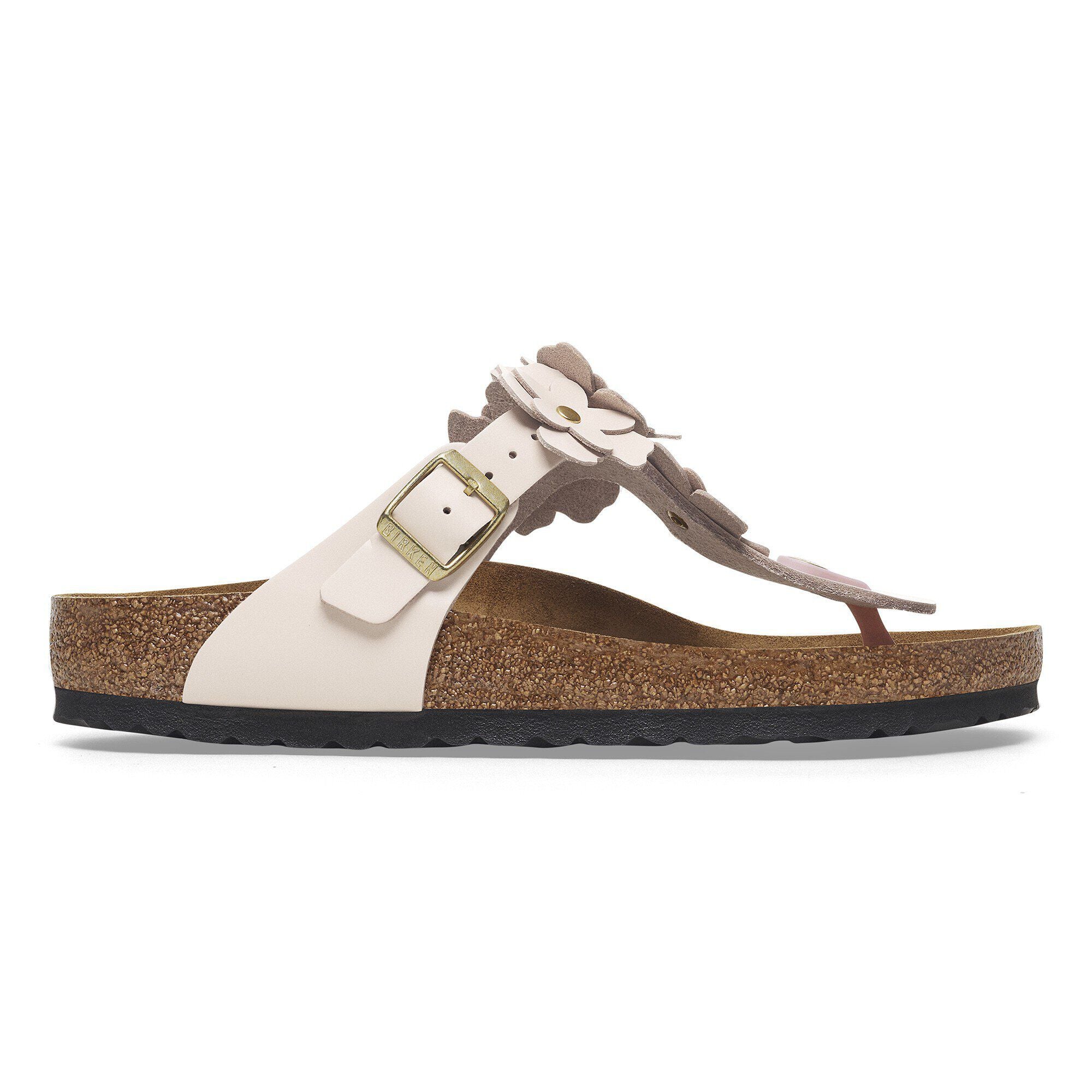 Sandal with floral design and buckle on a white background