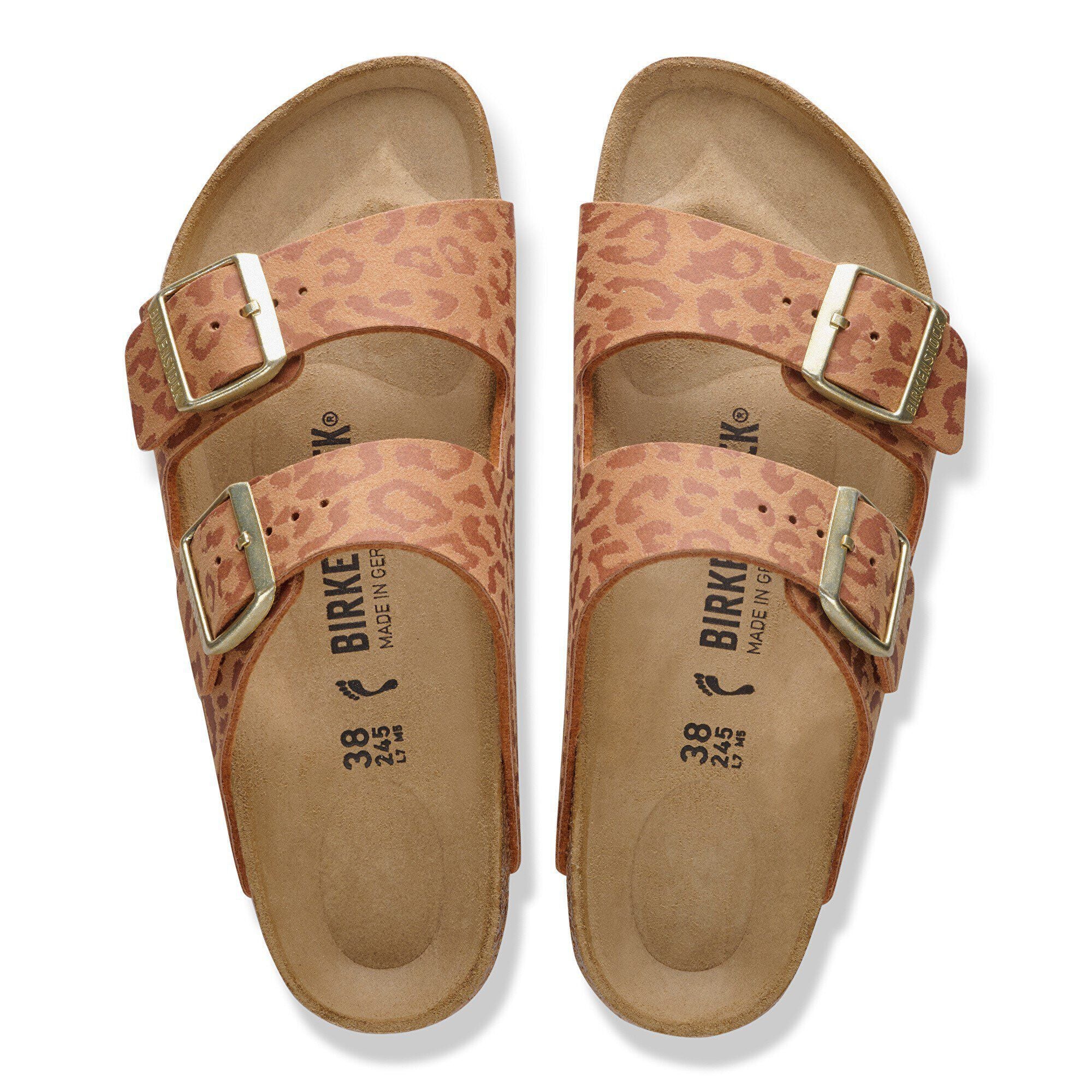Pair of leopard print sandals with gold buckles on a white background