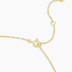 Gold bracelet on a white background