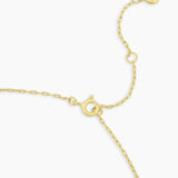 Gold bracelet on a white background