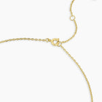 Gold bracelet on a white background
