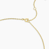 Gold bracelet on a white background