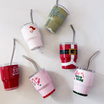 Set of colorful tumblers with straws on a white background