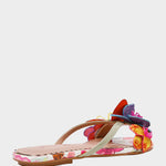 Colorful sandal with floral design on a white background