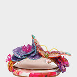 Colorful butterfly-shaped object on a white background