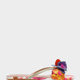 Colorful sandal with floral design on a white background