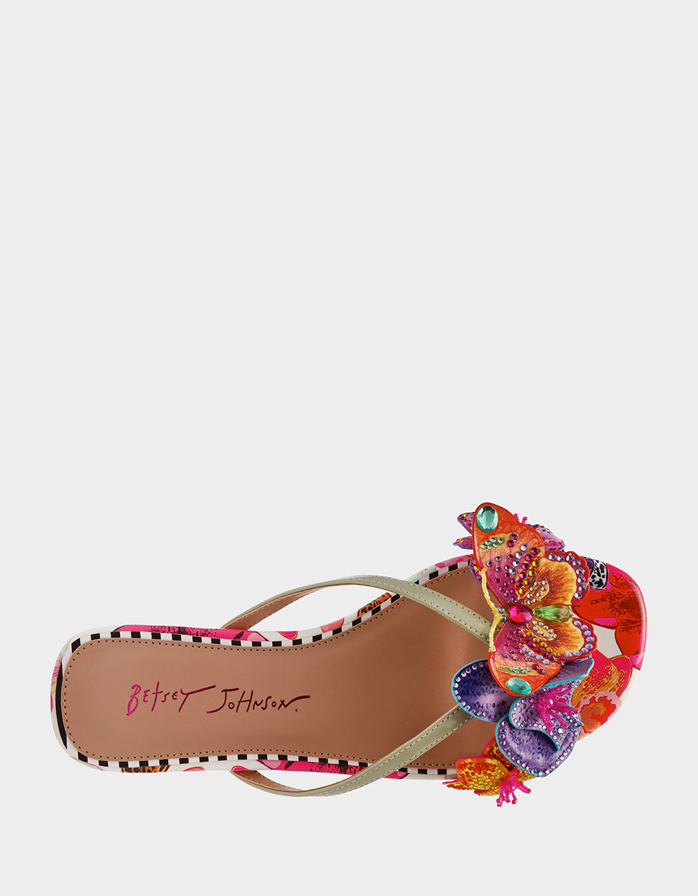 Colorful sandal with floral design on a white background