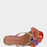 Colorful sandal with floral design on a white background