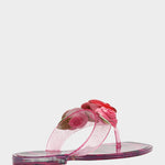 Pink sandal with floral design on a white background