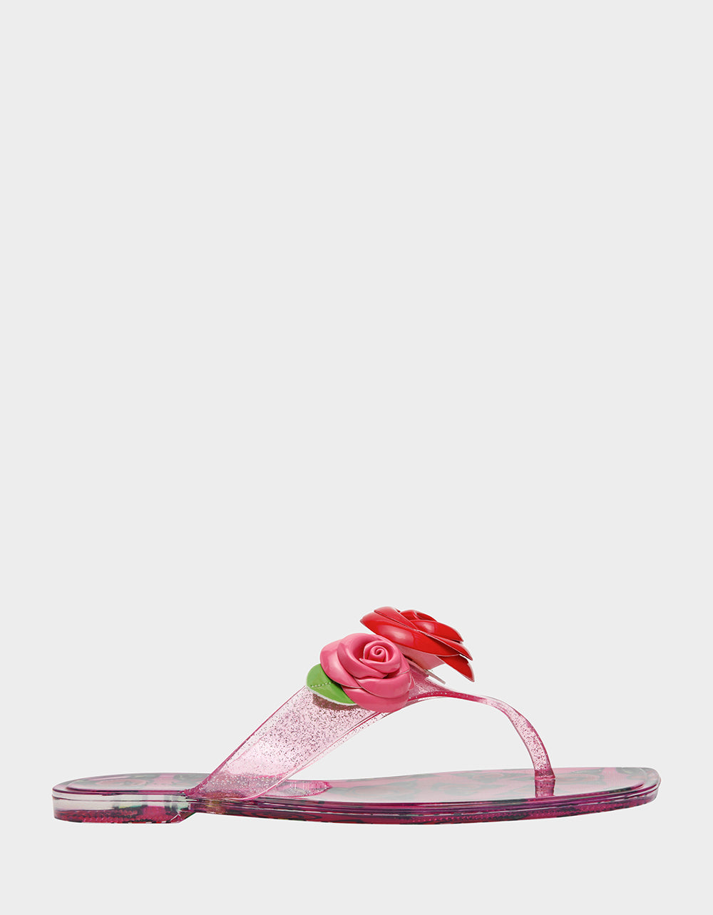 Clear sandal with a pink rose design on a light gray background
