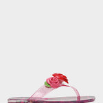 Clear sandal with a pink rose design on a light gray background