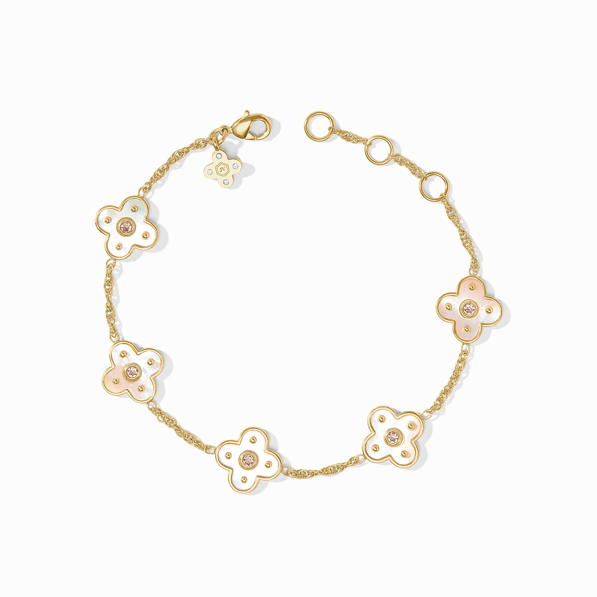 Gold bracelet with floral designs on a white background
