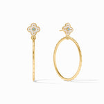 Gold hoop earrings with clover-shaped ends on a white background