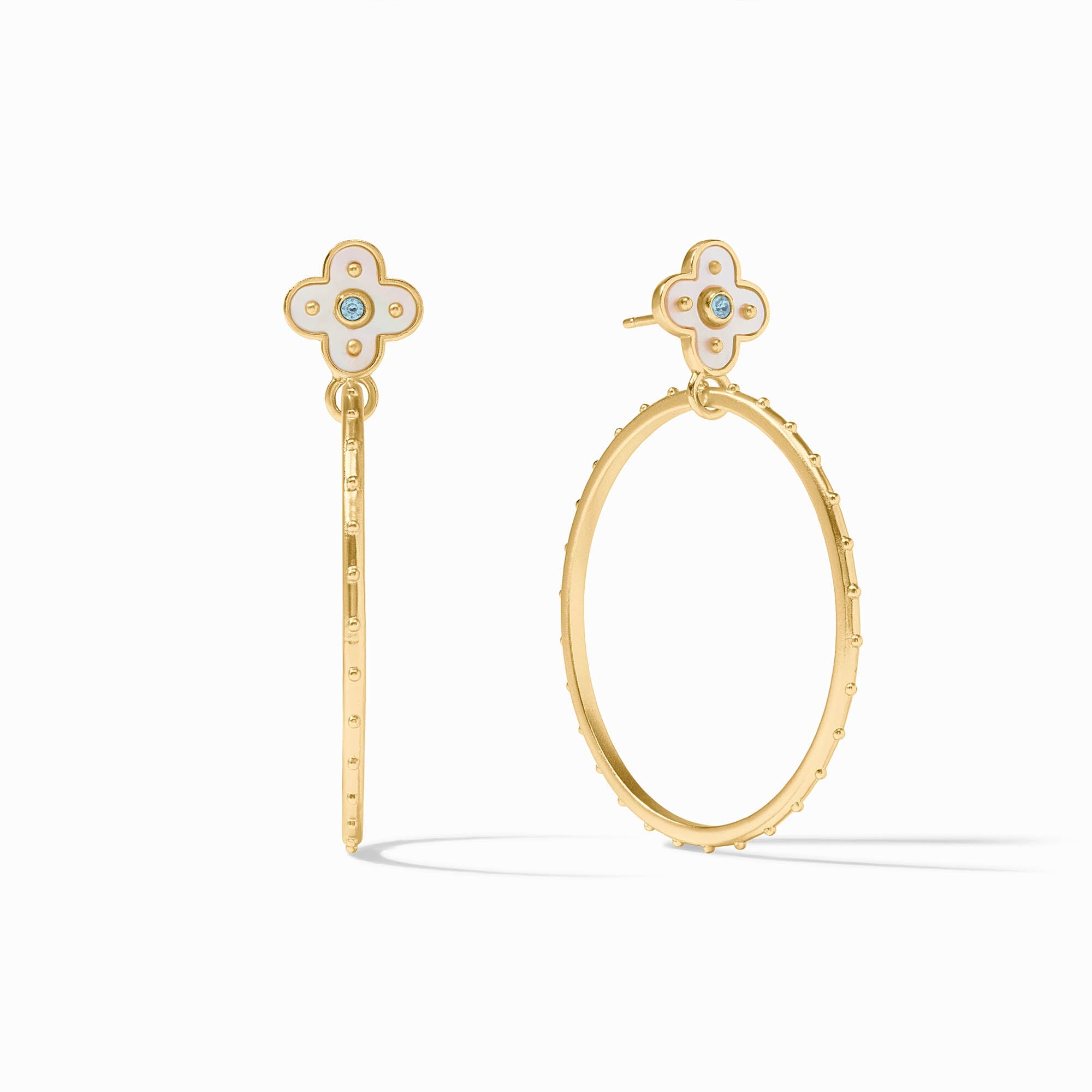 Gold hoop earrings with clover-shaped ends on a white background