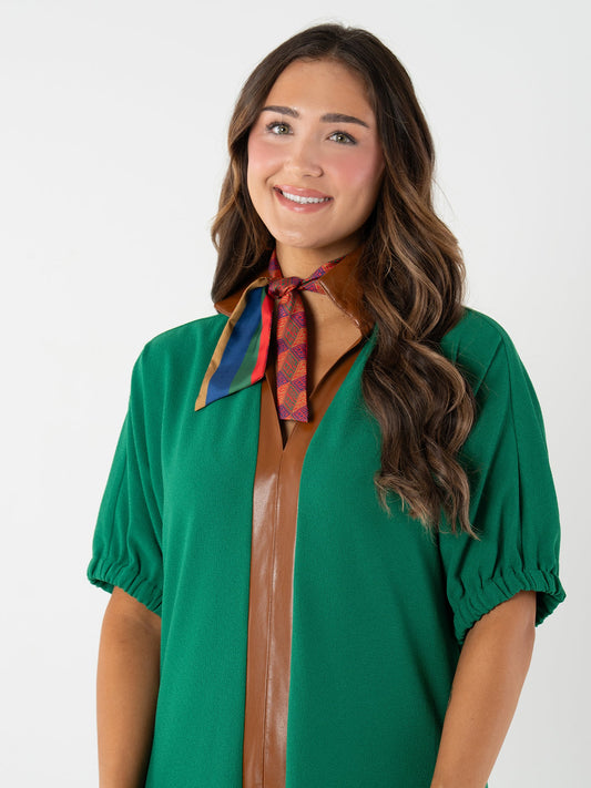 woman modeling a vintage monogram from Emily McCarthy scarf